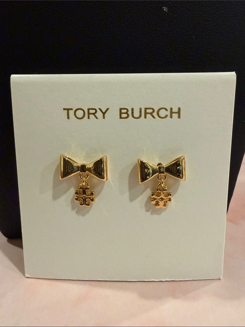 Tory Burch | Shiny Gold Plated Bow Drop Earrings with Logo Charm